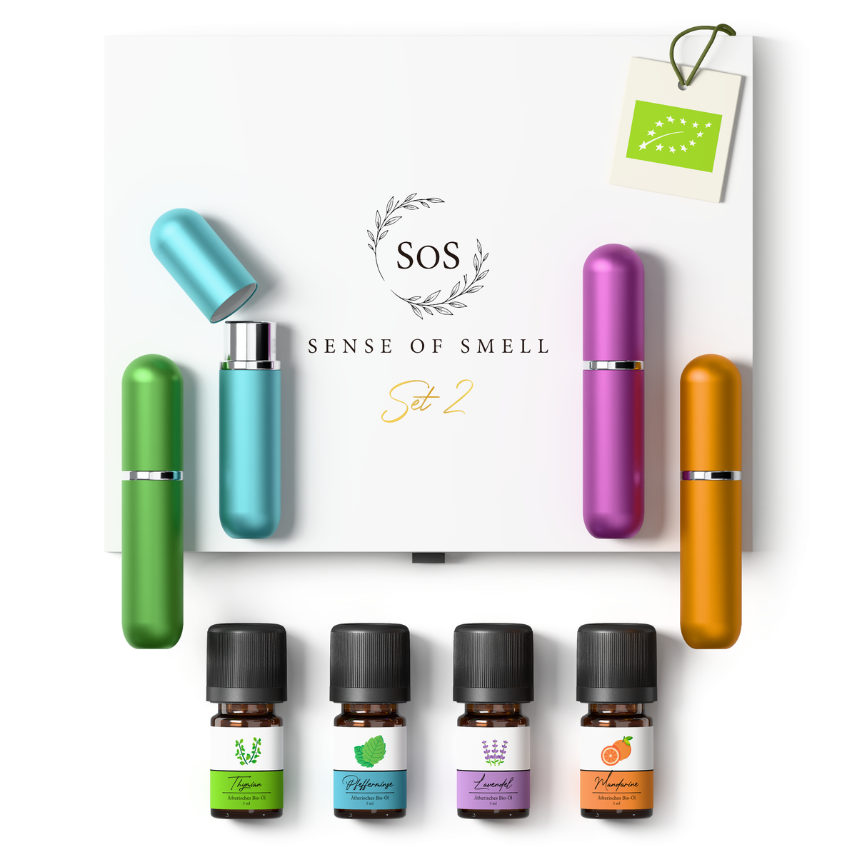 Riechtraining Set 2 mit vier Aluminium-Riechstiften, vier Bio-Ölen und weißer Geschenkbox.